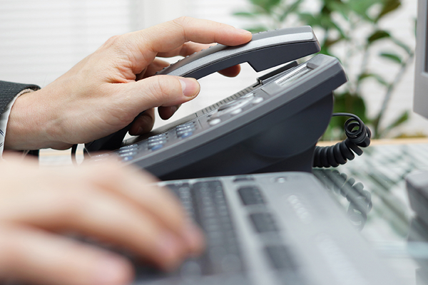Desk phone being answered — VoIP service providers